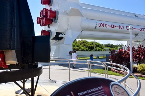 Kai and Kenny in the rocket garden at Kennedy Space Center, walking in the cool shade of the Saturn 1-B, which was the first launch vehicle to test-fly the Apollo lunar hardware. 